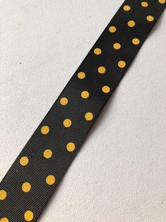 black grosgrain ribbon with yellow polka dots