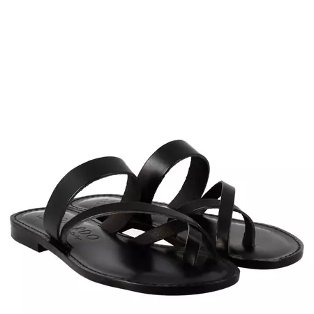 Black flat minimalist sandals with toe ring