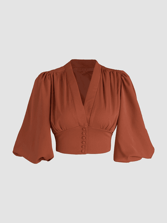 orange cropped blouse