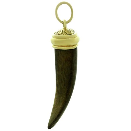 Van Cleef and Arpels Yellow Gold Wood Saber Tooth Charm Pendant For Sale at 1stDibs