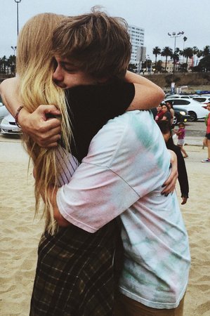 blonde hugging