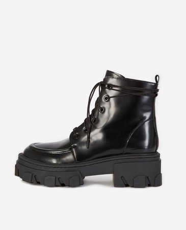 Black leather ankle boots with notched sole | The Kooples