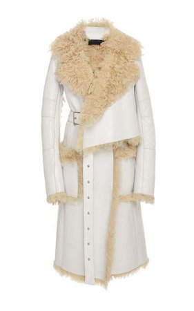 Proenza Schouler** shearling trim leather long coat features a belted waist and front patch pockets.