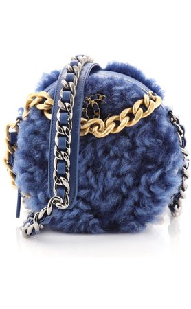 Chanel round blue fur bag