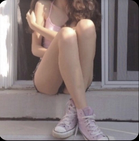 pink converse on the roof