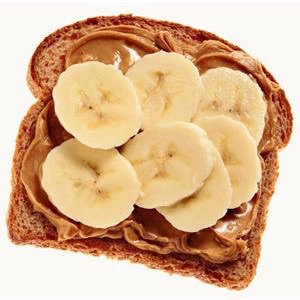 banana slices and peanut butter on wheat bread