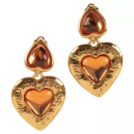 Yves Saint Laurent Golden Metal Clip-On Earrings with Orange Resin For Sale at 1stDibs