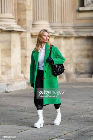 natalia-verza-wears-a-white-wool-polo-shirt-a-green-velvet-ribbed-picture-id1355053132 (408×612)