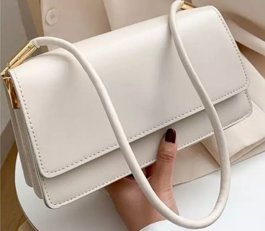 white leather bag