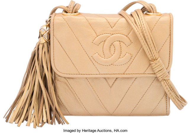 Chanel Gold Chevron Quilted Lambskin Leather Mini Tassel Flap Bag. | Lot #58265 | Heritage Auctions
