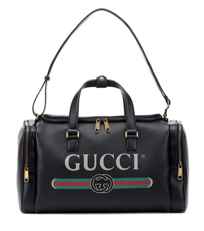 Gucci Print leather travel bag