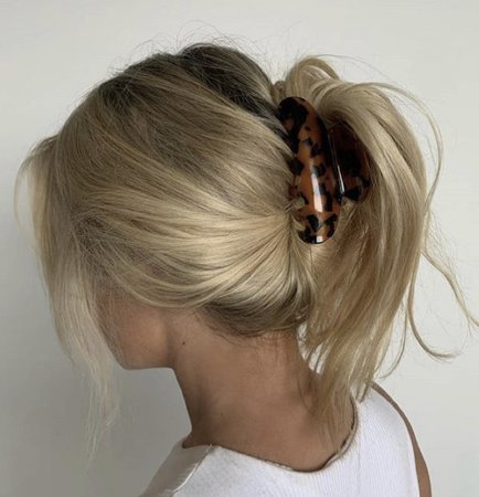 long blonde hair with claw clip
