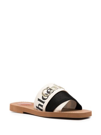 Shop black & neutral Chloé Woody logo flat sandals with Express Delivery - Farfetch