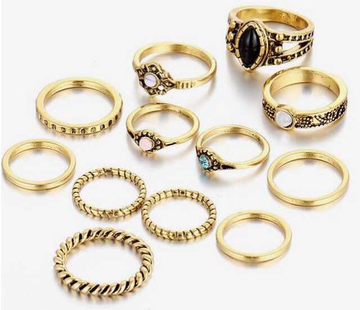 assorted rings gold jewelry golden gem gemstone gemstones jewels rings knuckle hand