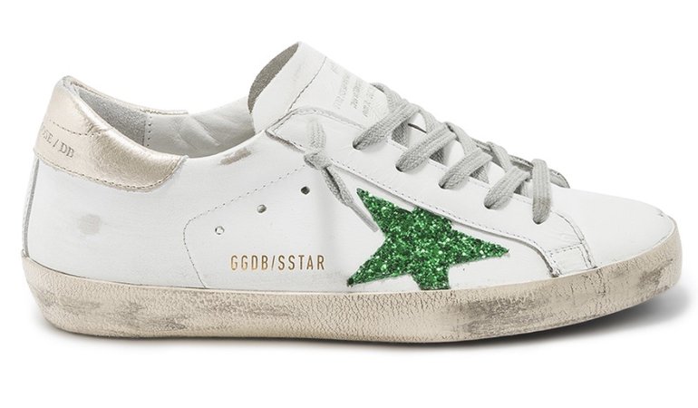 golden goose with green star