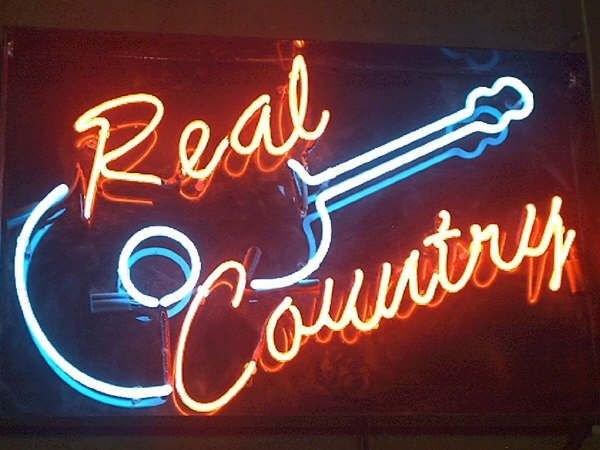 neon real country music sign