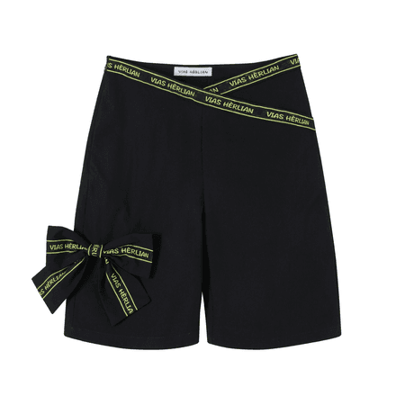 black shorts with green bow