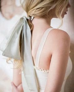 woman aesthetic blond blonde hair tied with blue ribbon