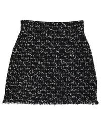 Chanel Pre-owned Wool Mini Skirt in Black - Lyst
