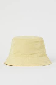 pastel yellow bucket hat – Google-haku