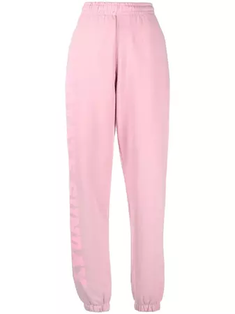 Shop ROTATE logo-print organic cotton track pants with Express Delivery - FARFETCH