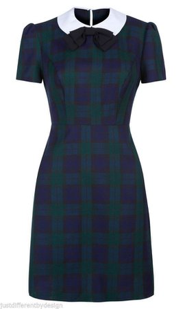 Blue and green check dress with black bow and white collar
