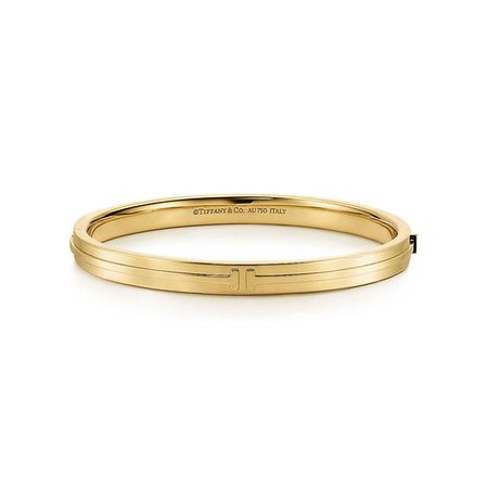 Tiffany T Two hinged bangle in 18k gold, medium. | Tiffany & Co.