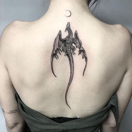 simple dragon back tattoo