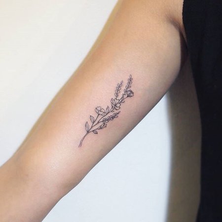inner arm tattoo