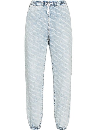 Shop Alexander Wang wide leg jean jogging trousers with Express Delivery - FARFETCH