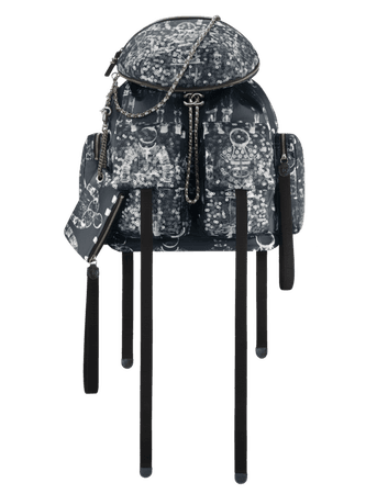 Chanel-BlackWhite-Printed-Nylon-Astronaut-Essentials-Backpack-Bag.png (564×720)