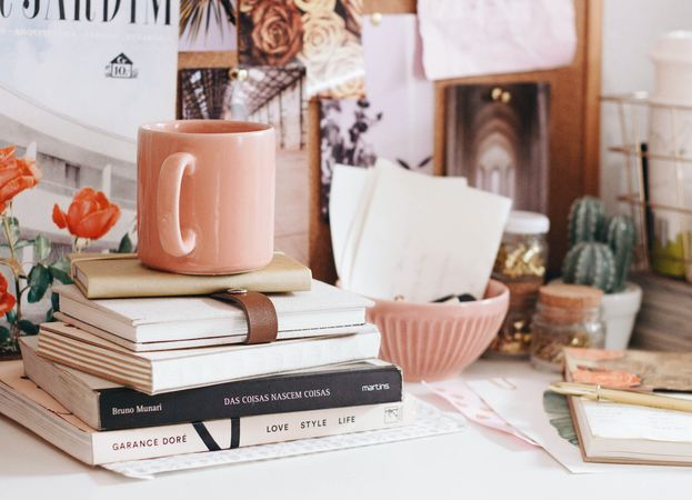 brown ceramic coffee mug on book photo – Free Image on Unsplash