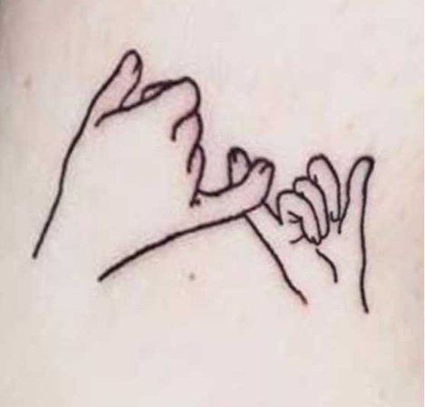 ‘adult’ and baby hand tattoo