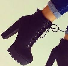 Black high heeled combat boots