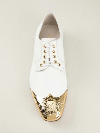 white and gold shoes