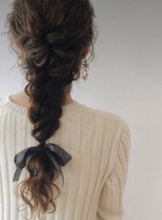 curly hair academia hairstyle braid with ribbon