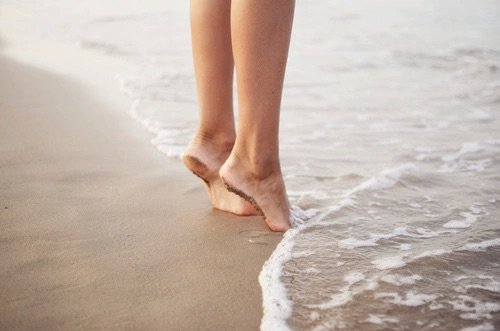 barefoot on the beach