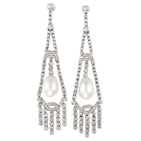 An Important Pair Of Art Deco Pearl And Diamond Earrings For Sale at 1stDibs | pearl and diamond chandelier earrings, art deco chandelier earrings, 1920s pearl earrings
