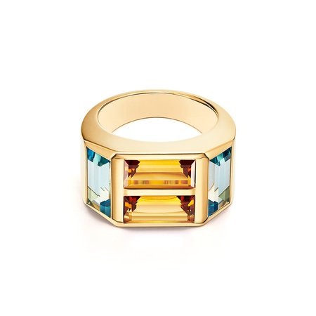 Paloma's Studio baguette four-stone ring in gold with blue topazes and citrines. | Tiffany & Co.