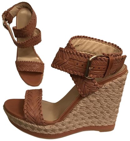 Google Image Result for https://img-static.tradesy.com/item/22562671/stuart-weitzman-brown-beige-new-woven-leather-sandals-size-us-10-regular-m-b-0-1-960-960.jpg