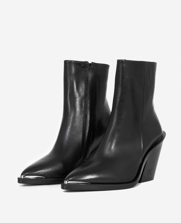 Cowboy-style heeled black ankle boots | The Kooples