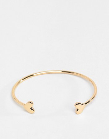 ASOS DESIGN cuff bracelet with heart detail in gold | ASOS