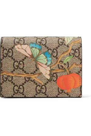 Gucci | Printed coated-canvas and textured-leather wallet | NET-A-PORTER.COM