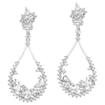18 Karat White Gold White Diamond Flare Pear Baguette Dangling Earring For Sale at 1stDibs