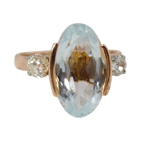 Rose Gold Ring Adorned With An Oval Aquamarine ... | Antikeo