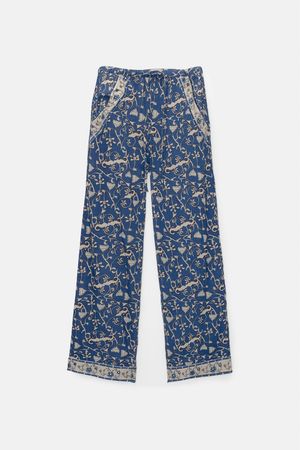 Loose-fitting floral print pants - pull&bear