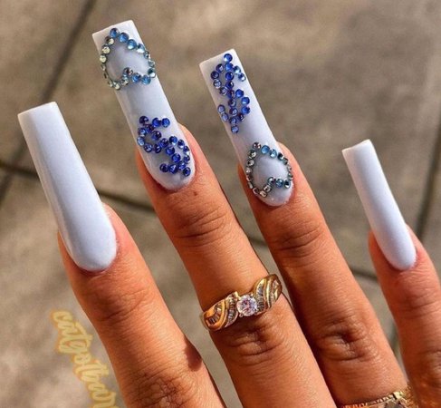 white nails with blue bling