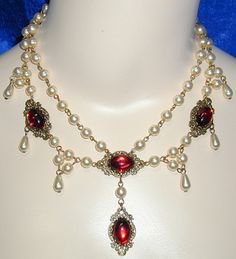 Vintage costume jewelry, antique jewelry and handcrafted Renaissance jewelry have been our specialties since 1997