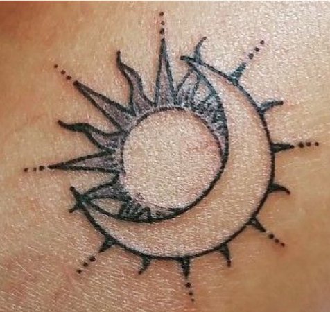 moon/sun tattoo