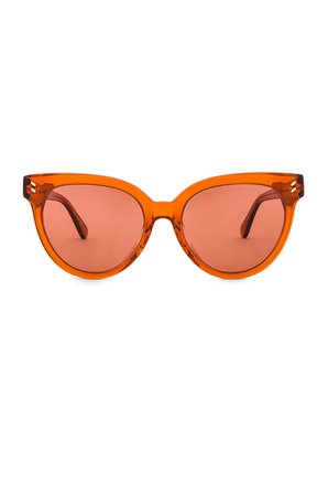 Stella McCartney Round Cat Eye Acetate in Shiny Transparent Dark Orange & Orange | REVOLVE